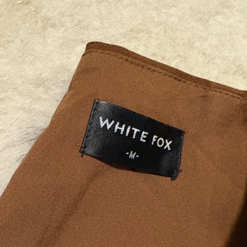 white fox skirt.
